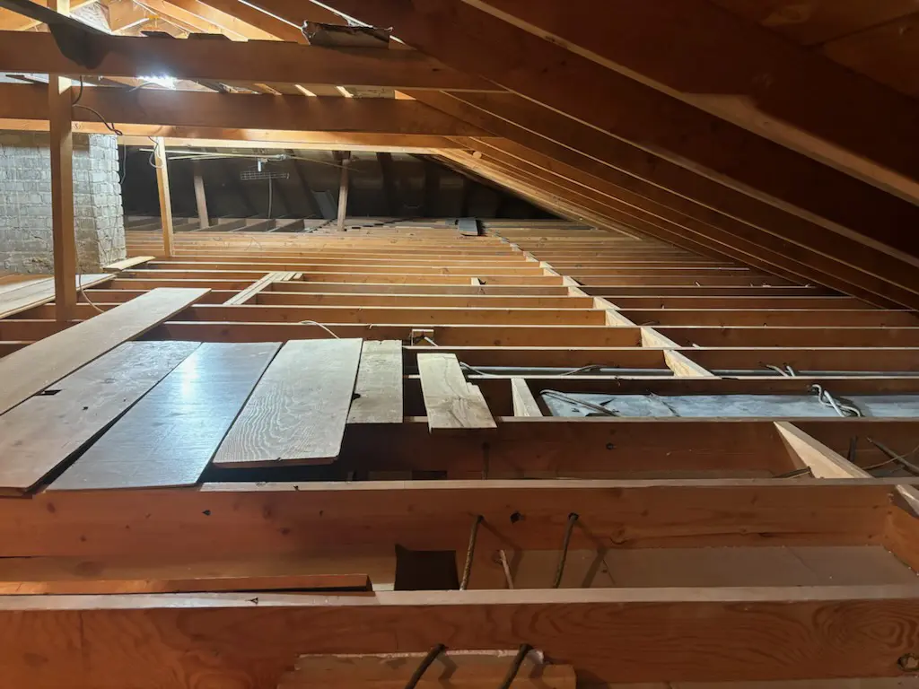 After Vermiculite abatement in attic totally clear of Vermiculite insulation