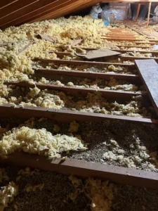 Before Vermiculite Abatement with attic full of Vermiculite insulation